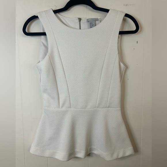 H&M, size XS, white peplum top with long back zipper, fitted. Sleeveless - Picture 2 of 6